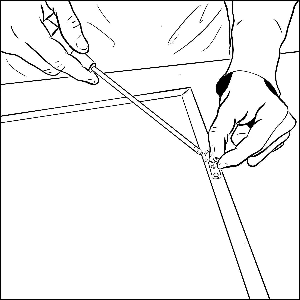 A hand using a screwdriver to attach a metal D-ring to the side rail of a picture frame back, with the ring opening oriented up toward the top of the frame.
